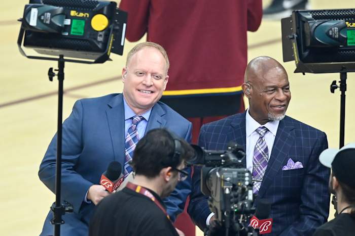 Mar 21, 2022; Cleveland, Ohio, USA; Cleveland Cavaliers television broadcasters John Michael (left) and Austin Carr work prior to a game between the Cleveland Cavaliers and the Los Angeles Lakers at Rocket Mortgage FieldHouse.